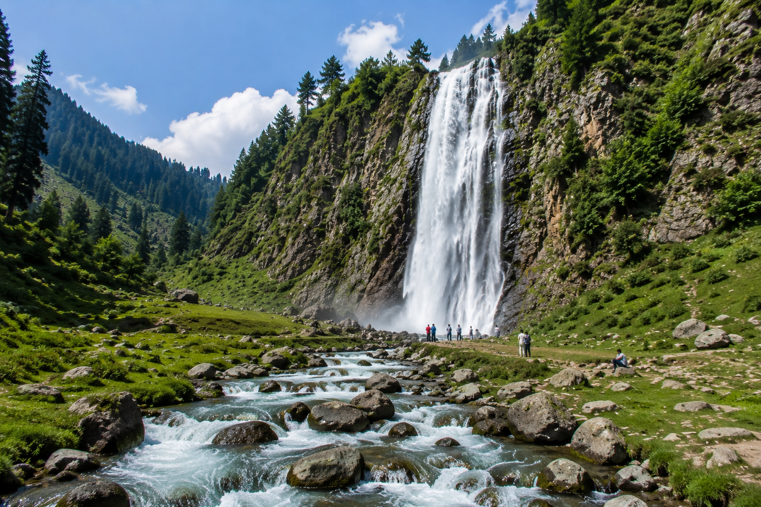 Drung Waterfall cascading through lush green valleys near Gulmarg, Kashmir